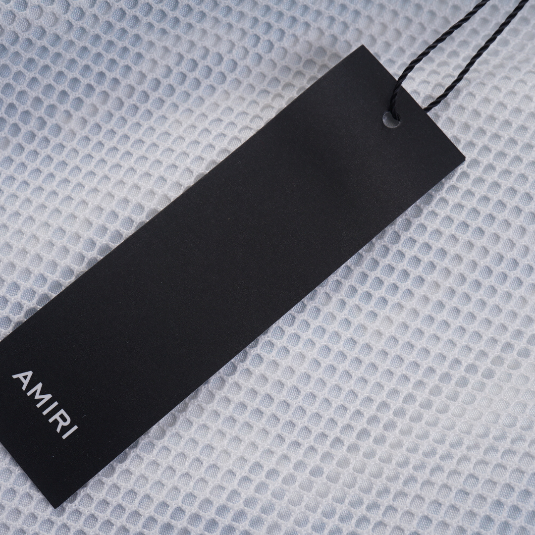 Set corto con monogramma Amr