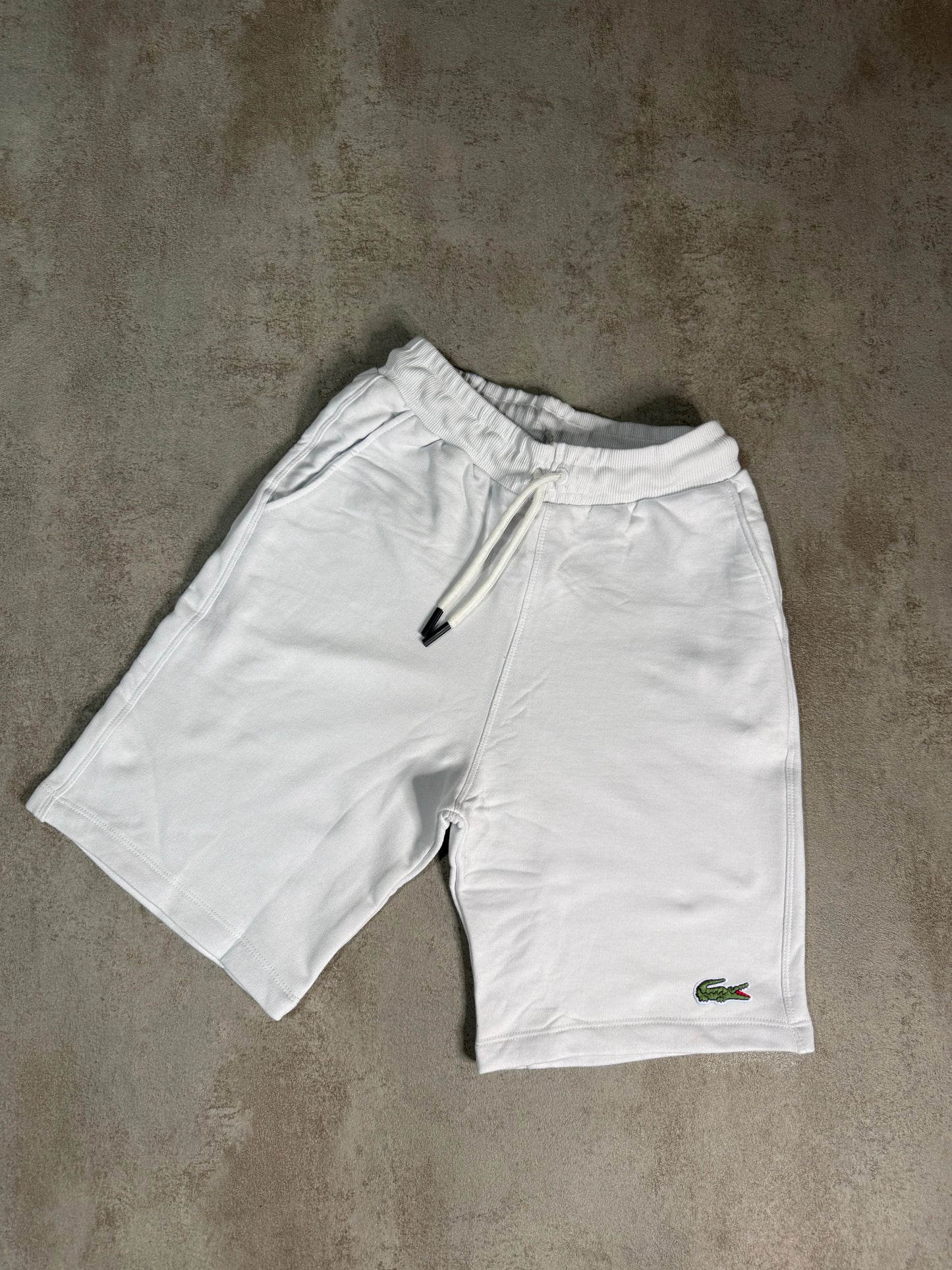 Pantalones corto LACOST£