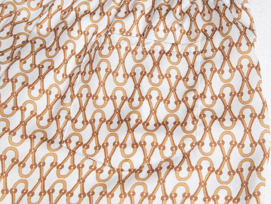 PANTALONES CORTOS GUCÇI