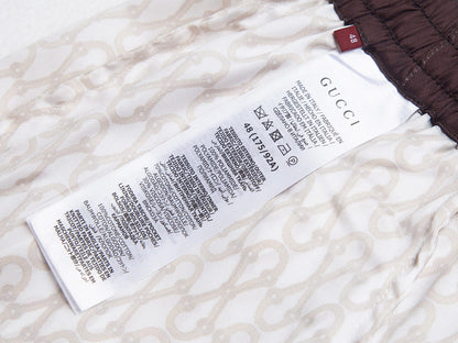 PANTALONES CORTOS GUCÇI