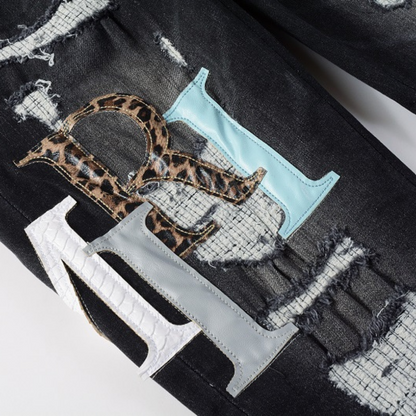 Jeans neri rovinati con logo Amr