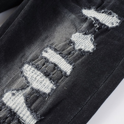 Jeans neri rovinati con logo Amr