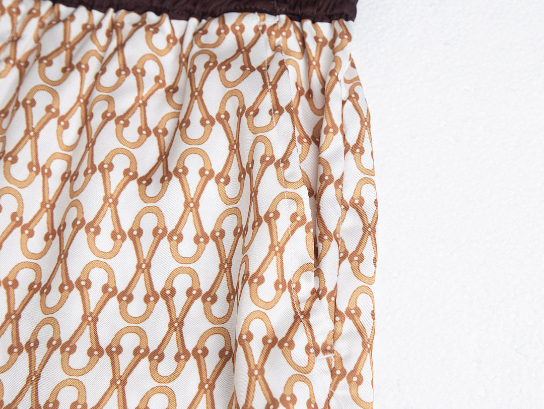 PANTALONES CORTOS GUCÇI