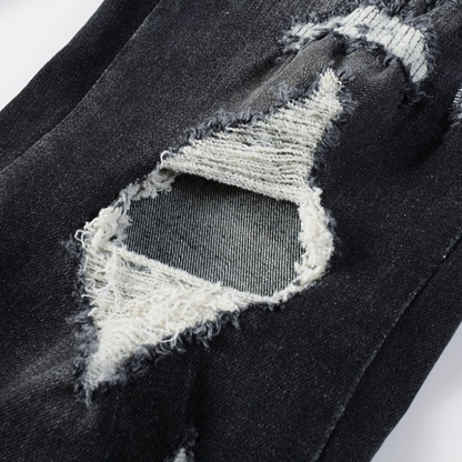Jeans neri rovinati con logo Amr
