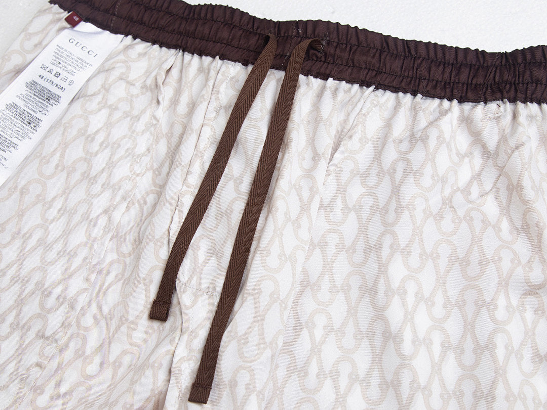 PANTALONES CORTOS GUCÇI