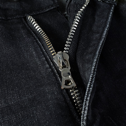Jeans neri rovinati con logo Amr