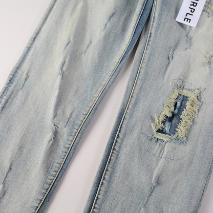 Jeans azzurro sfumato viola