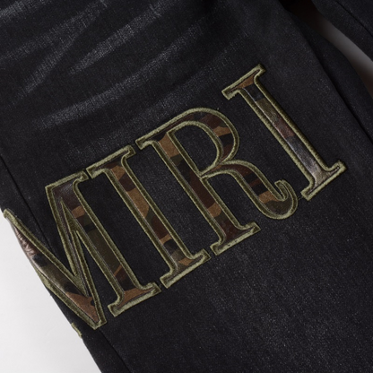 Jeans in denim con applicazioni Amr