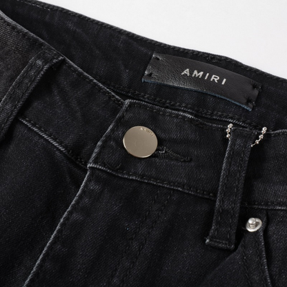 Jeans in denim con applicazioni Amr