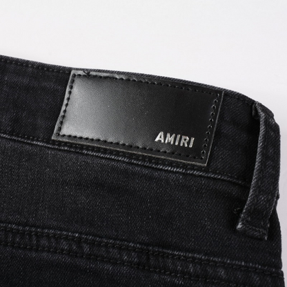 Jeans in denim con applicazioni Amr