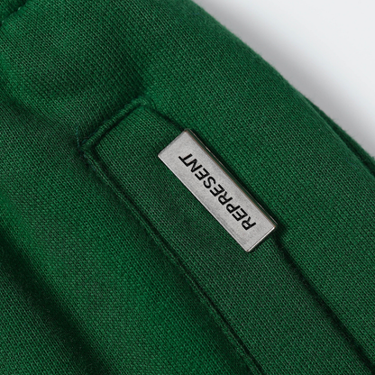 Pantaloni con monogramma Rappresenta