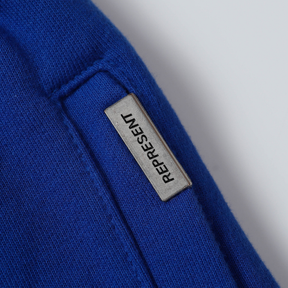 Pantaloni con monogramma Rappresenta