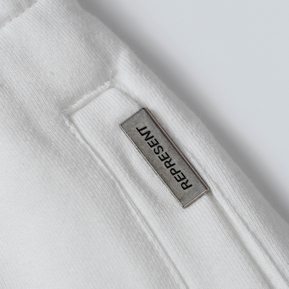 Pantaloni con monogramma Rappresenta