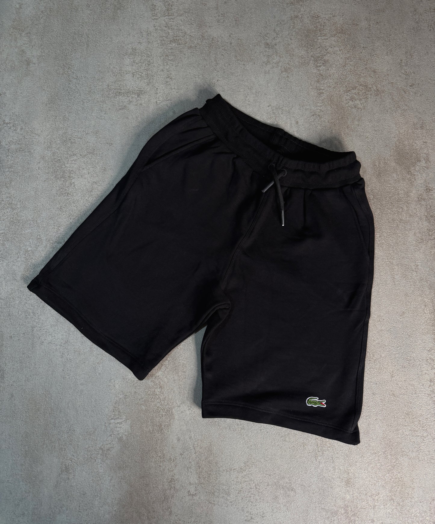 Pantalones corto LACOST£