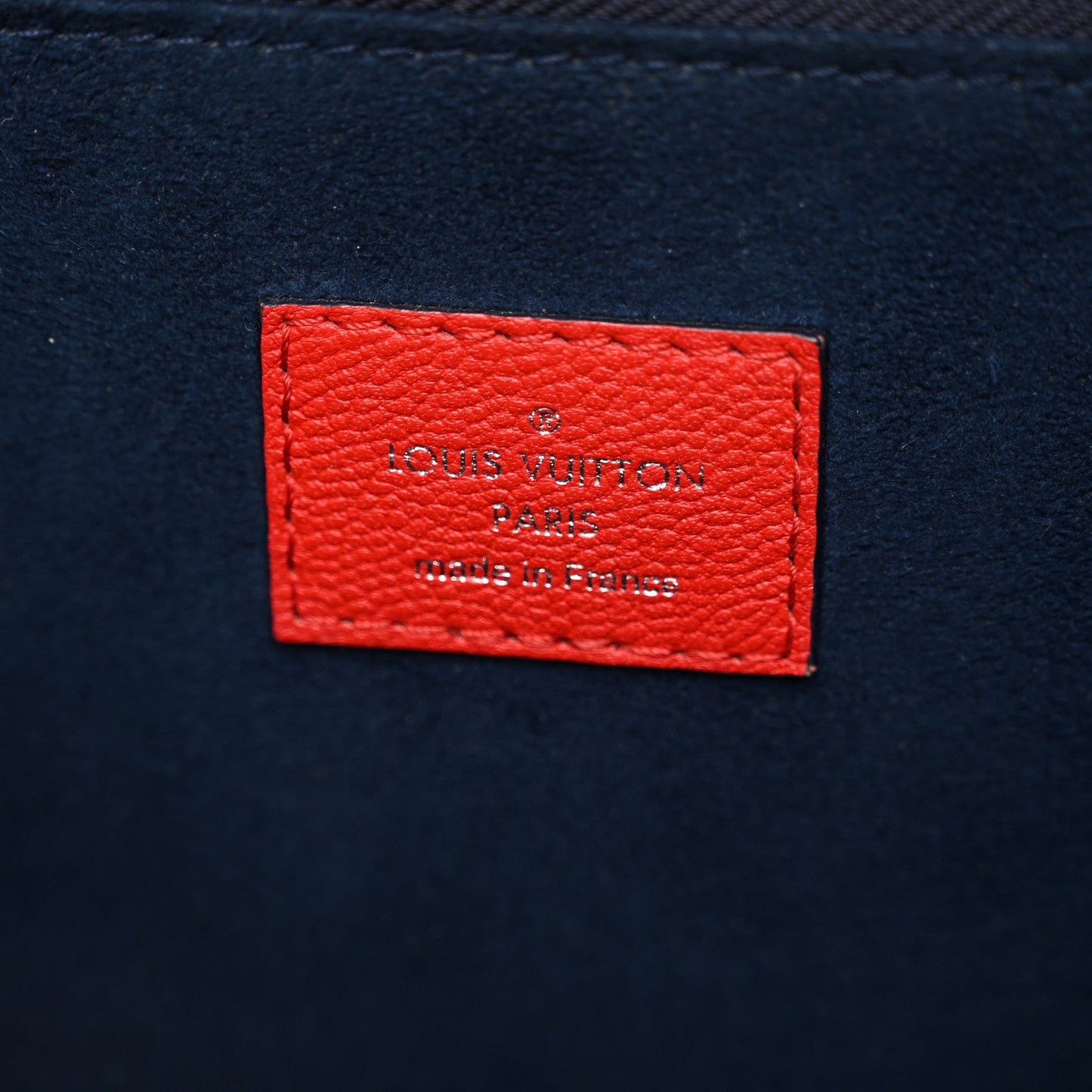 Epi Twist Tote Coquelicot