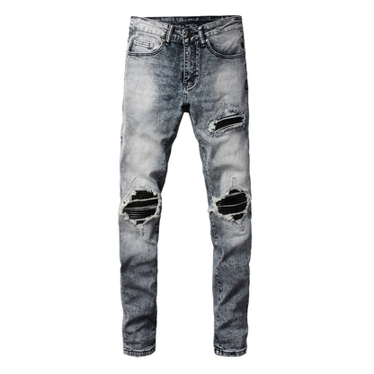 Jeans Amr con toppe nere