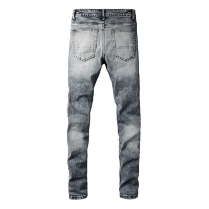 Jeans Amr con toppe nere