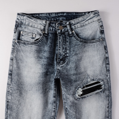 Jeans Amr con toppe nere