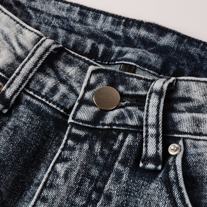 Jeans Amr con toppe nere