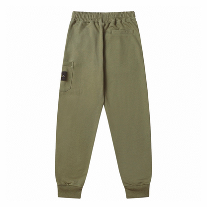 Pantaloni con monogramma in pietra