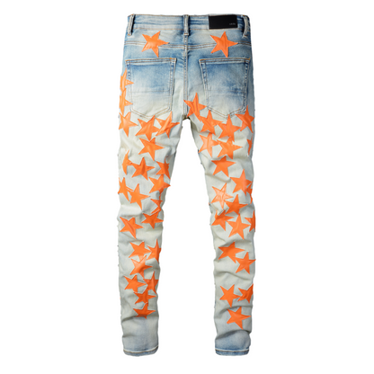 Jeans Amr con toppa a stella arancione