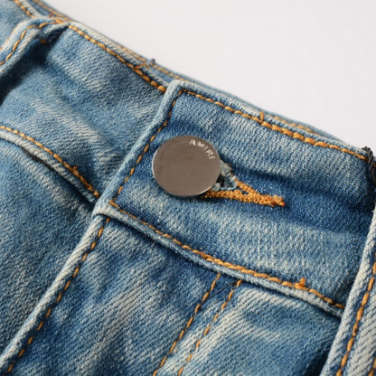 Jeans Amr con toppa a stella arancione