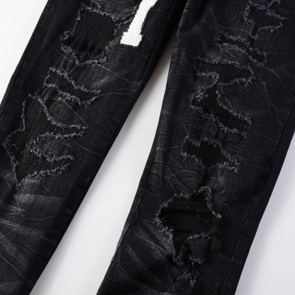 Jeans strappati con logo bianco Amr
