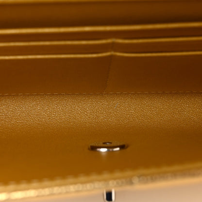 Metallic Caviar Quilted Top Handle Long Clutch With Chain Gold