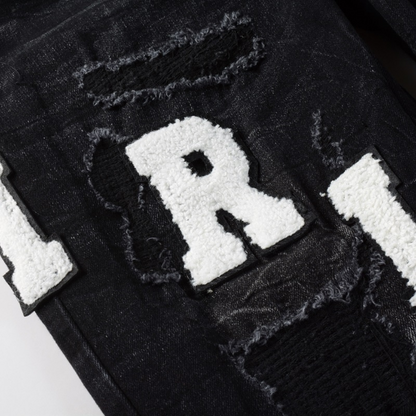 Jeans strappati con logo bianco Amr