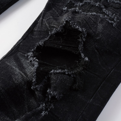 Jeans strappati con logo bianco Amr