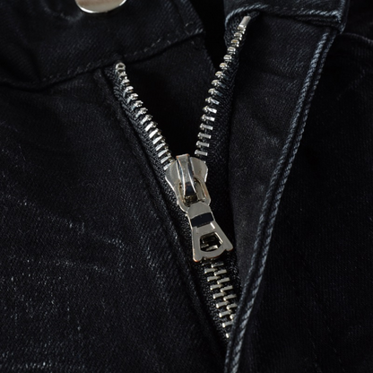 Jeans strappati con logo bianco Amr