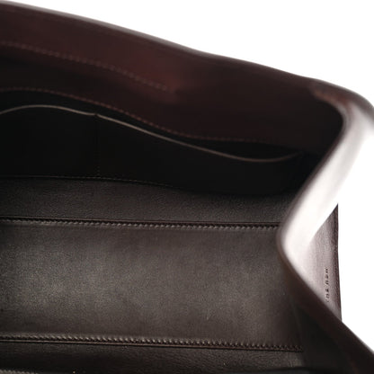 Polished Saddle Calfskin Peggy Clutch Burgundy
