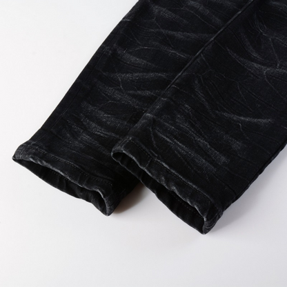Jeans strappati con logo bianco Amr