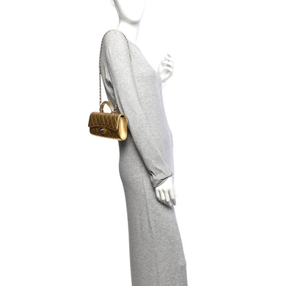 Metallic Caviar Quilted Top Handle Long Clutch With Chain Gold