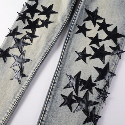 Jeans Amr con toppa a stella nera