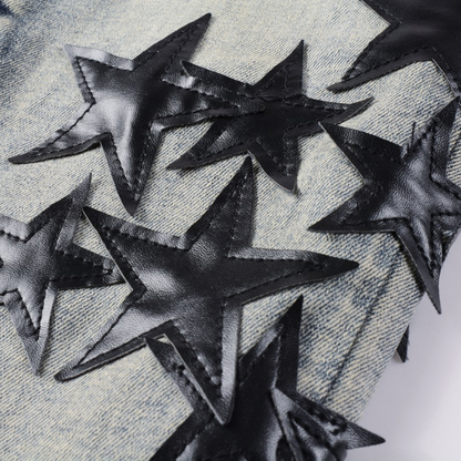 Jeans Amr con toppa a stella nera