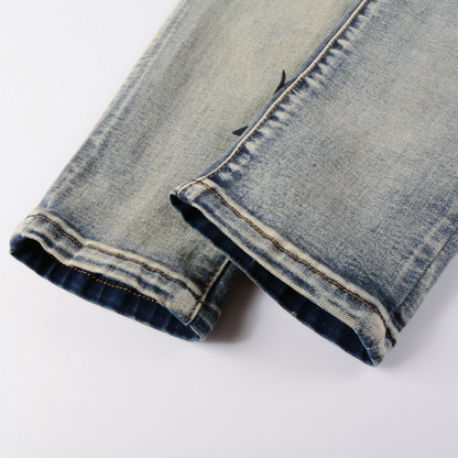 Jeans Amr con toppa a stella nera