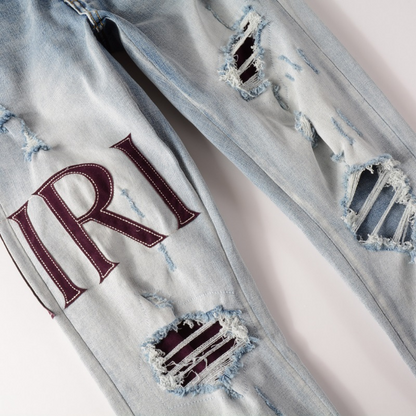 Jeans strappati con logo Amr