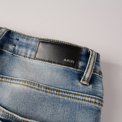 Jeans strappati con logo Amr