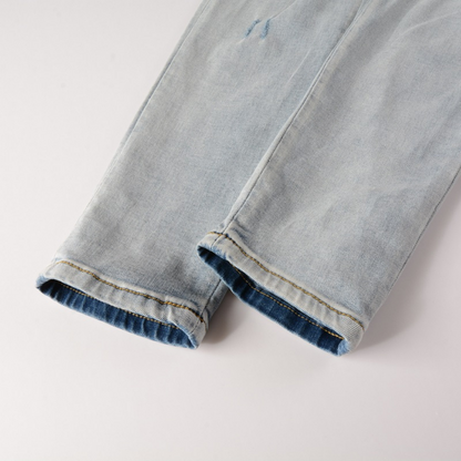Jeans strappati con logo Amr