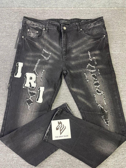 Jeans strappati con logo bianco Amr