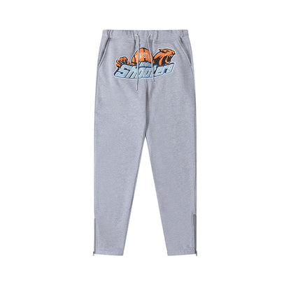 Pantaloni da tuta grigio-arancio dei Shooters
