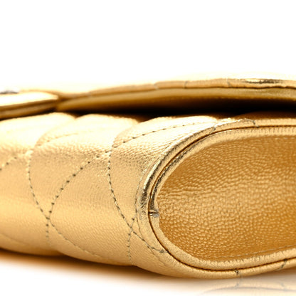 Metallic Caviar Quilted Top Handle Long Clutch With Chain Gold