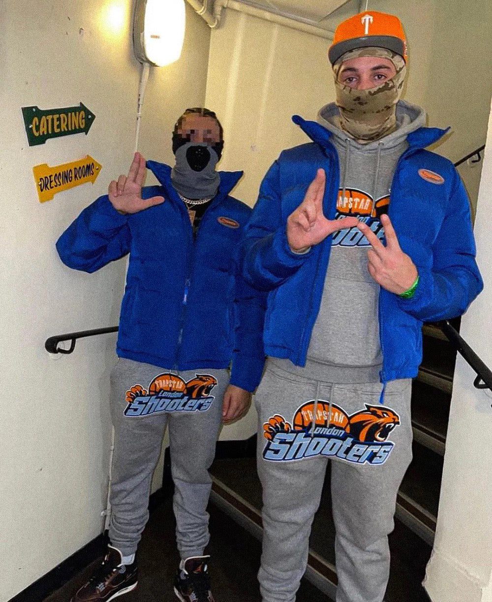 Pantaloni da tuta grigio-arancio dei Shooters